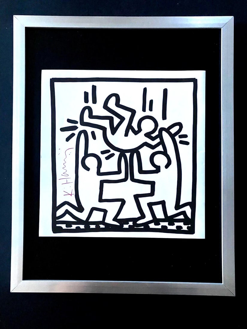KEITH HARING + SIGNED VINTAGE PRINT FRAMED: This is a Beautiful and Scarce Vintage 1989 Print after Keith Haring FACSIMILE SIGNED IN RED INK Print is about 8x8in. Mounted and Framed covering an area of 15x12 in. Printed in Bond Paper after the 
