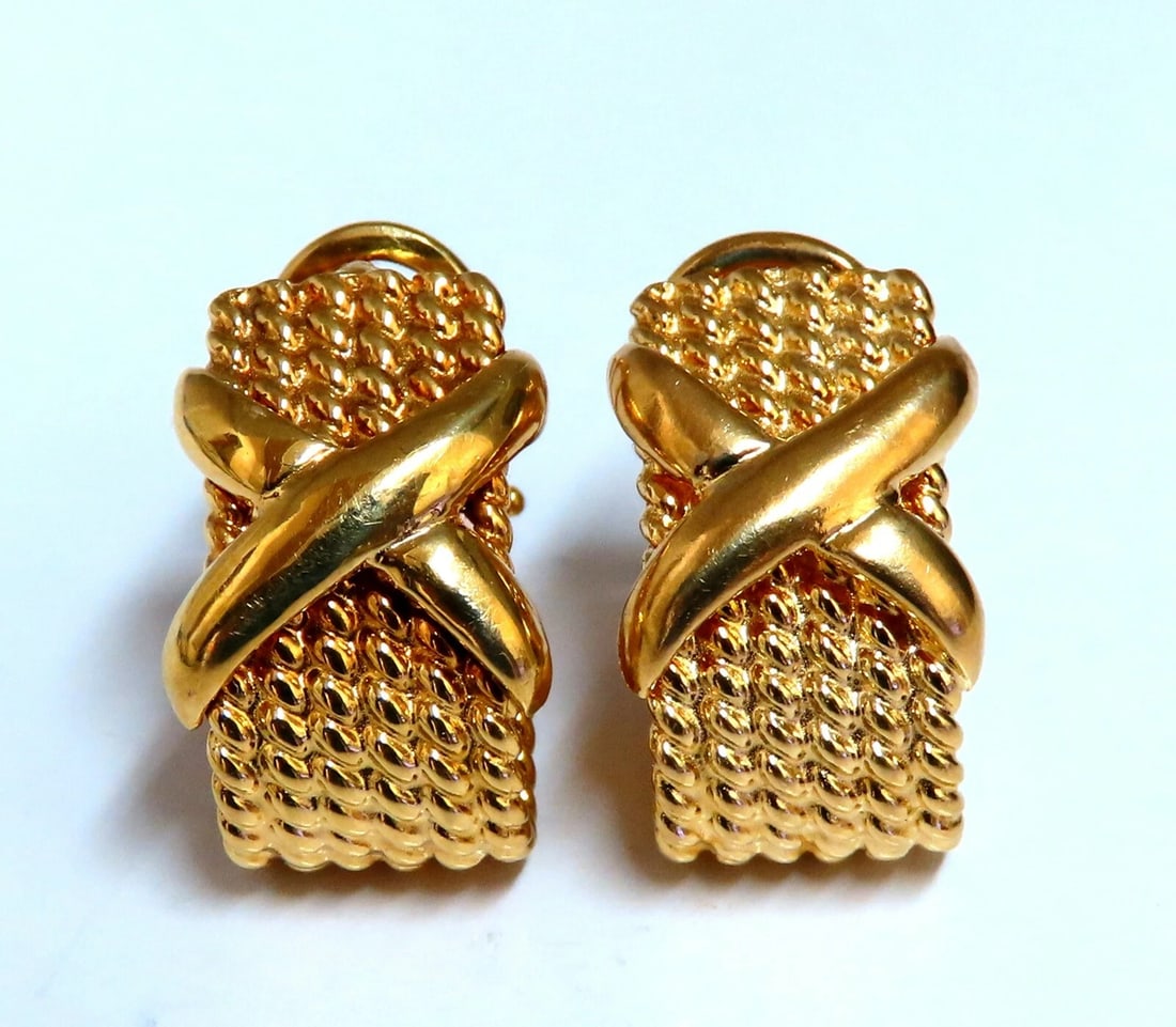 14kt Gold Braid Semi Hoop X Clip Earrings**: Title: 14kt Gold Braid Semi Hoop X Clip Earrings** Description: Gold X Clip Earrings Measurements of Earrings: .79 x .50 Inch Depth: .58 inch Comfortable Omega Clips 14.9 grams / 14kt. Yellow Gold Ear