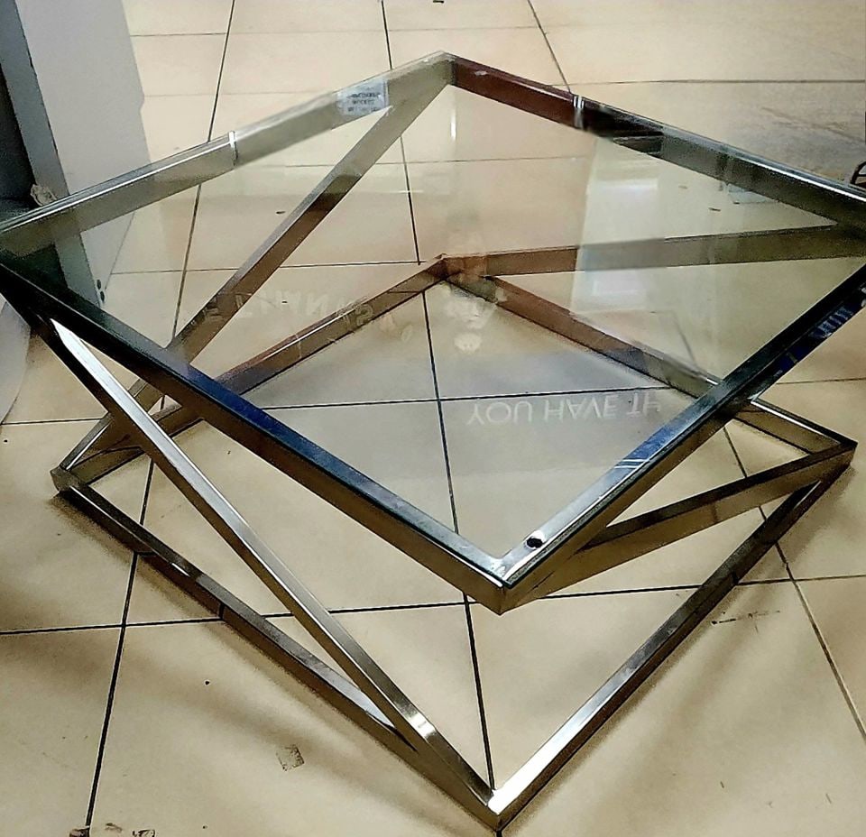 Vintage Signature Design Modern Brushed Nickel & Glass 36" Square Coffee Table by Ashley?: Vintage Signature Design Modern Brushed Nickel & Glass 36" Square Coffee Table by Ashley? Coylin Reserve: $400.00 Shipping: Domestic: Shipping rates are determined by destination International: Foreig