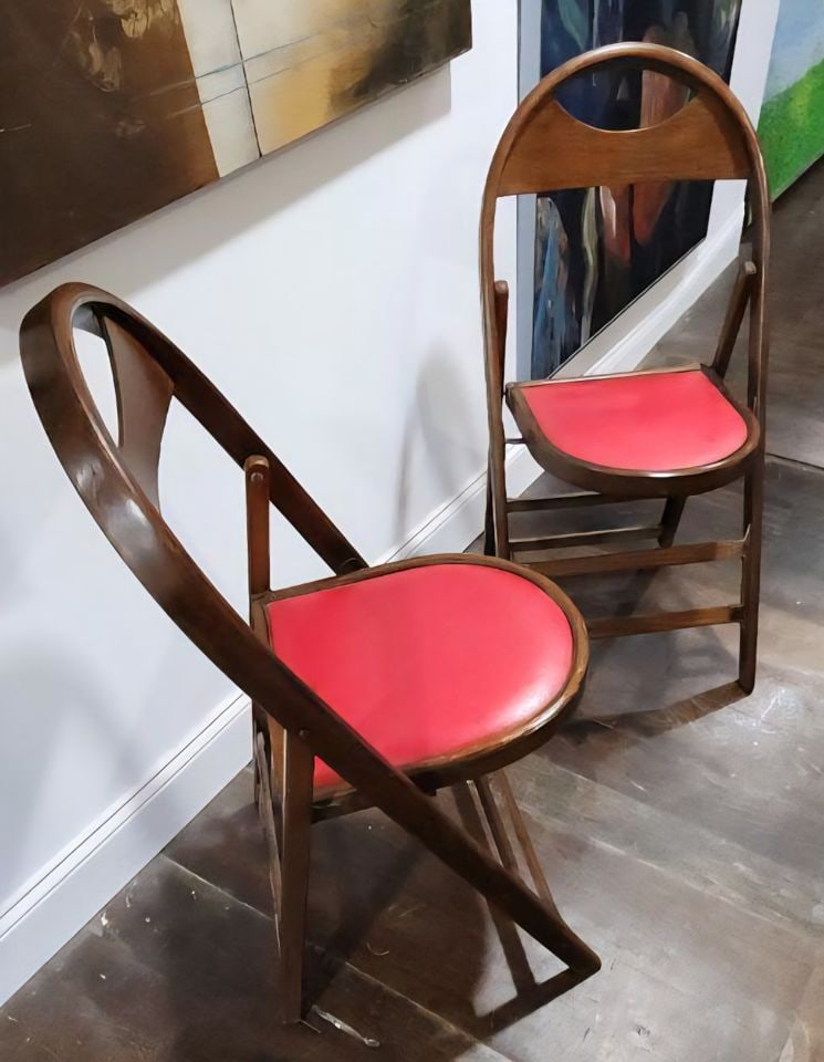 Pair of rare antique wood and vinyl folding chairs: Pair of rare antique wood and vinyl folding chairs Reserve: $125.00 Shipping: Domestic: Shipping rates are determined by destination International: Foreign shipping rates are determined by destination