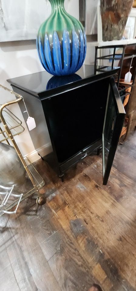 Modern designer deco-style black lacquer cabinet w/ pop-open glass door & bottom drawer. 24w x 18.5 - 4