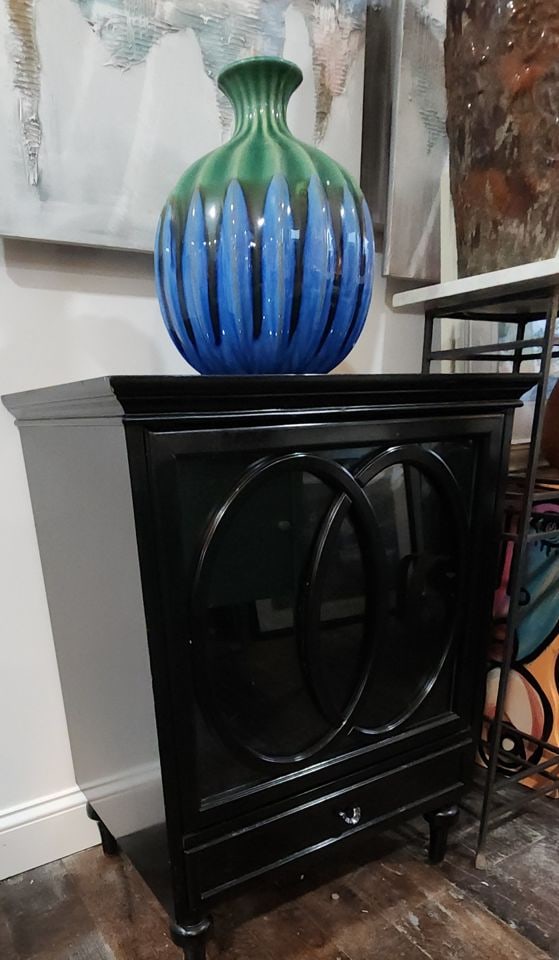 Modern designer deco-style black lacquer cabinet w/ pop-open glass door & bottom drawer. 24w x 18.5 - 9