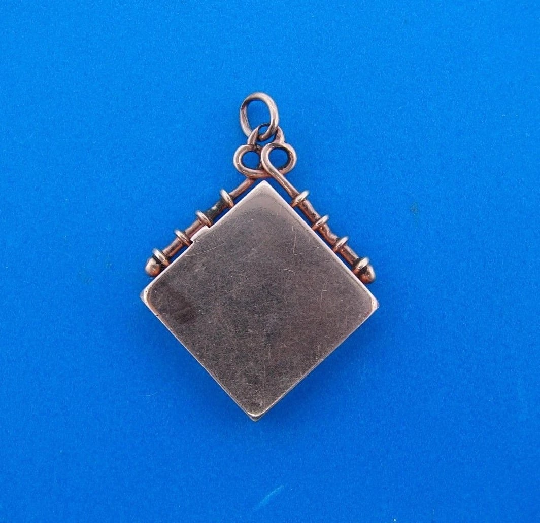 UNIQUE Victorian 10k Rose Gold Pendant/Charm: Title: UNIQUE Victorian 10k Rose Gold Pendant/Charm Description: DK 10k Rose Gold Charm/Pendant Circa 1900s · The weight is 7.2 grams. · The height with bail is 1 ½ inches. The width is