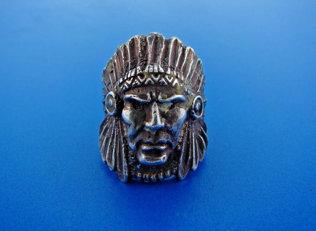 COOL Silver Native American Chief Ring: Title: COOL Silver Native American Chief Ring Description: DK Silver Native American Chief Ring · This is a must for any collector. · The weight is 13.1 grams. · The height is 1 inch.