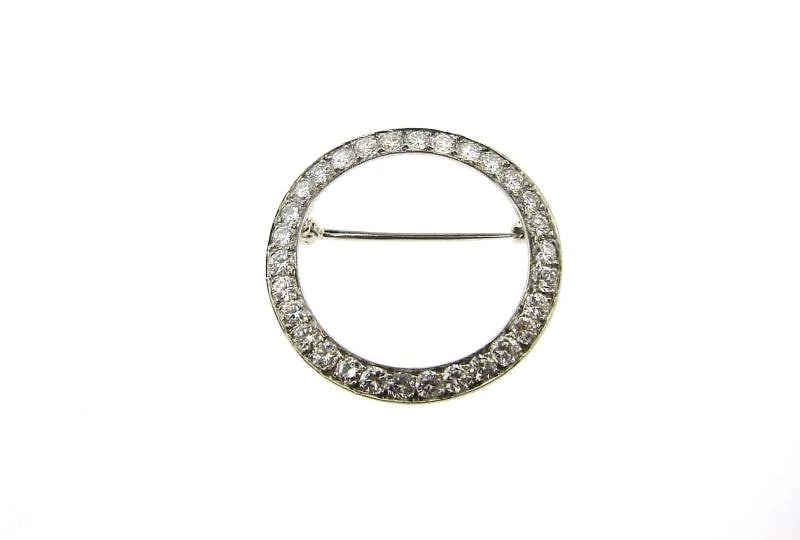 STUNNING Tiffany & Co. Platinum & Diamond Eternity Pin: Title: STUNNING Tiffany & Co. Platinum & Diamond Eternity Pin Description: d Tiffany & Co. Platinum & Diamond Eternity Pin This wonderful pin is designed by Tiffany & Co. and is circa 1960. This