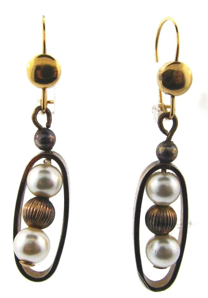 CHIC Silver & Pearl Earrings: Title: CHIC Silver & Pearl Earrings Description: DK Silver & Pearl Earrings · Wonderful earrings that is a necessity in your collection. · The weight is 2.8 grams. · The length is 1 5/8