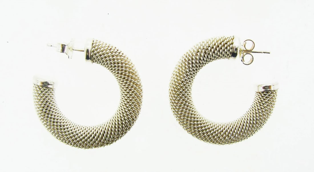 TRENDY Silver Mesh Hoop Earrings Circa 1980s!: Title: TRENDY Silver Mesh Hoop Earrings Circa 1980s! Description: DK Silver Mesh Hoop Earrings Circa 1980s! This wonderful item is one of a kind! The weight is 12.4 grams. The height is 1 1/8 inches. 