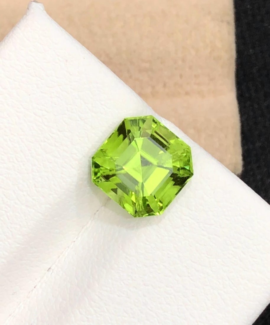 Apple Green Peridot Asscher Cut Gemstone From Sapat Valley , 3.25 Carat: Highlights Supplies for making crafts Materials: Gemstone: Peridot Carat weight: 3.25 Peridot Details * Weight : 3.25 carat * Dimension : 8.1*8.1*6.4 MM * Color : Apple Green * Shape : Asscher ( Squar