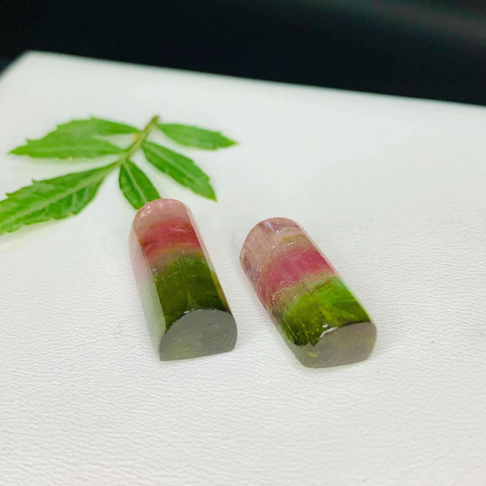 Tri-Color Tourmaline Cabochon Pair: Afghan Gemstone, 30.20 Carat: Highlights Supplies for making crafts Materials: Gemstone: Tourmaline Carat weight: 30.20 Weight : 30.20 carat Dimensions : 19.2*9*6.8 - 19.2*8.7*7.9 MM Shape : Barrel Clarity : Clean Color : Tri