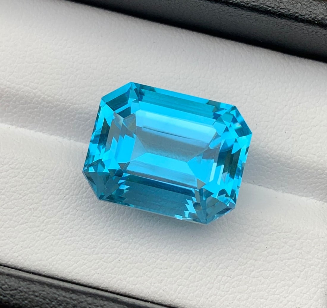 22.90 Carat Emerald Cut Swiss Blue Topaz Gemstone: Highlights Supplies for making crafts Materials: Gemstone: Topaz Carat weight: 22.90 Swiss Blue Topaz Gemstone | Natural Swiss Blue Color | Emerald Cut | Swiss Topaz Ring | Topaz Vintage | Wedding Top