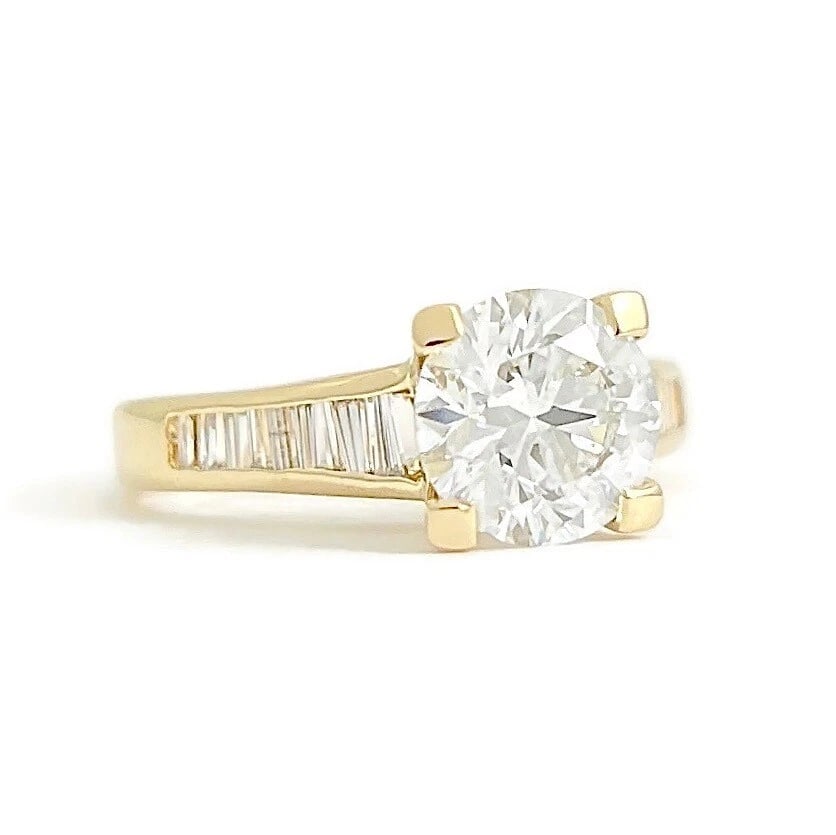 GIA Round Channel-Set Baguette Diamond Engagement Ring 18K Yellow Gold 1.78 CTW: GIA Round Channel-Set Baguette Diamond Engagement Ring 18K Yellow Gold 1.78 CTW This is a lovely diamond engagement ring! Please let us know if you have any questions. Diamonds: 1.78 ctw; 1 round bril