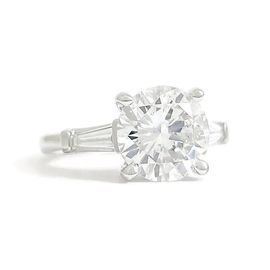 GIA Round Tapered Baguette Diamond Engagement Ring 14K White Gold, 2.93 CTW: GIA Round Tapered Baguette Diamond Engagement Ring 14K White Gold, 2.93 CTW This is a beautiful diamond engagement ring! Please let us know if you have any questions. Diamonds: 2.93 ctw; 1 round brill