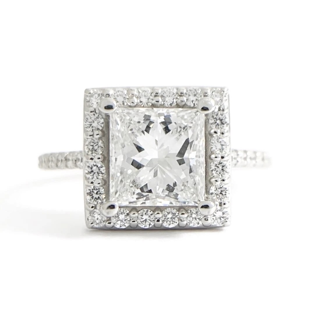 GIA Square Halo Princess Diamond Engagement Ring 18K White Gold 2.46 CTW: GIA Square Halo Princess Diamond Engagement Ring 18K White Gold 2.46 CTW This is a gorgeous diamond engagement ring! Please let us know if you have any questions! Diamonds: 2.46 ctw; 1 princess cut, 2