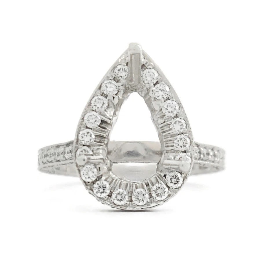 Pear Halo Diamond Engagement Ring Setting Mounting 18K White Gold 1.21 CTW: Pear Halo Diamond Engagement Ring Setting Mounting 18K White Gold 1.21 CTW This is a gorgeous diamond engagement ring mounting ready to house a diamond or gemstone of your choice. Don't hesitate to as