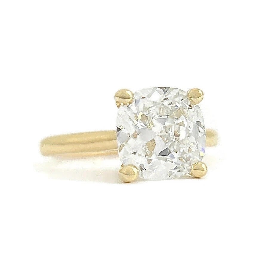 GIA Cushion Diamond Solitaire Engagement Ring 14K Yellow Gold, 3.30 CT: GIA Cushion Diamond Solitaire Engagement Ring 14K Yellow Gold, 3.30 CT This is a beautiful diamond engagement ring! Please let us know if you have any questions. Diamonds: 1 cushion cut 3.30 ct, K, I1