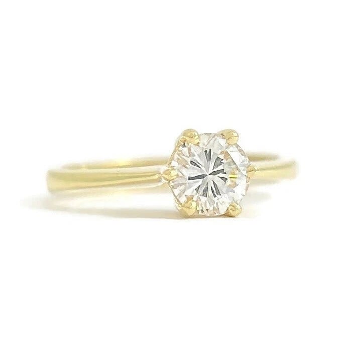 Round Solitaire Diamond 6-Prong Engagement Ring 18K Yellow Gold .36 CT: Round Solitaire Diamond 6-Prong Engagement Ring 18K Yellow Gold .36 CT This is a beautiful diamond engagement ring! Please let us know if you have any questions. Diamonds: one round brilliant cut,