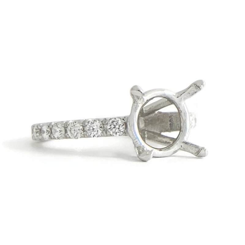 4-Prong Diamond Band Engagement Ring Setting Mounting Platinum .54 CTW: 4-Prong Diamond Band Engagement Ring Setting Mounting Platinum .54 CTW This is a gorgeous diamond engagement ring mounting ready to house a diamond or gemstone of your choice. Don't hesitate to ask