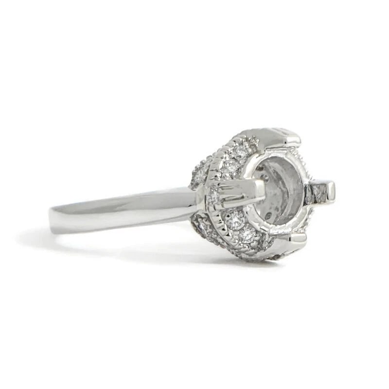 Round Pave Milgrain Diamond Engagement Ring Setting Mounting Platinum .24 CTW: Round Pave Milgrain Diamond Engagement Ring Setting Mounting Platinum .24 CTW This is a gorgeous diamond engagement ring mounting ready to house a diamond or gemstone of your choice. Don't hesitate