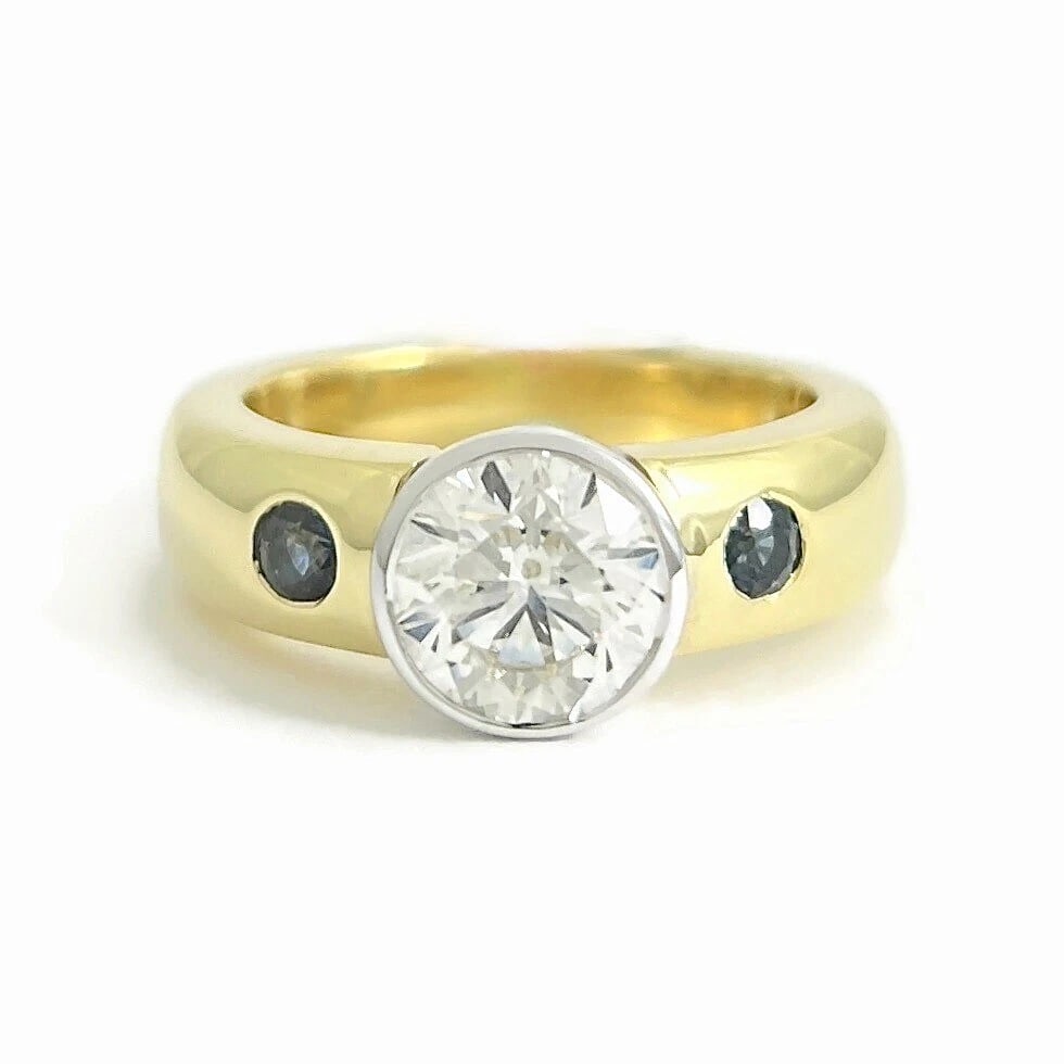 GIA Round Diamond Bezel-Set Sapphire Engagement Ring 18K Yellow Gold, 1.90 CTW: GIA Round Diamond Bezel-Set Sapphire Engagement Ring 14K Yellow Gold, 1.90 CTW This is a beautiful diamond engagement ring! Please let us know if you have any questions. Diamonds: one round brilliant