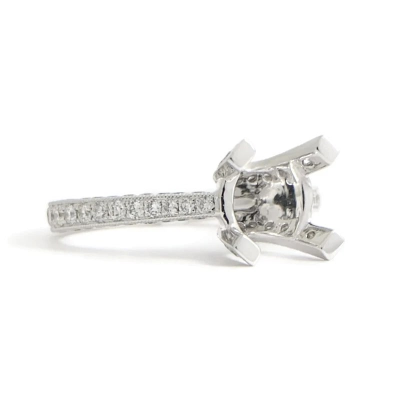 Pave Diamond Prong Engagement Ring Setting Mounting 18K White Gold 1.05 CTW: Pave Diamond Prong Engagement Ring Setting Mounting 18K White Gold 1.05 CTW This is a beautiful diamond engagement ring mounting ready to house a diamond or gemstone of your choice. Don't hesitate to