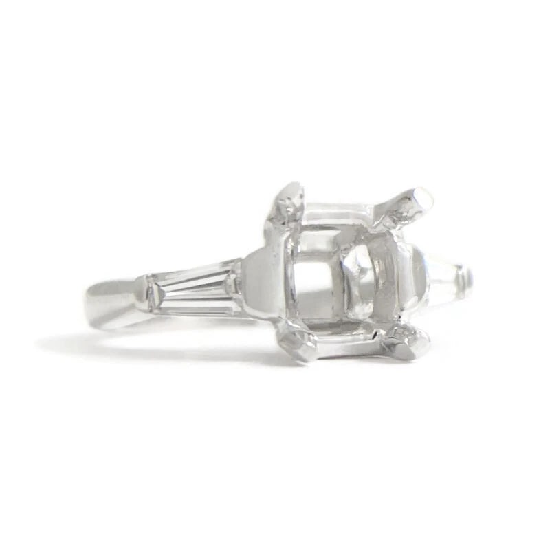 Tapered Baguette Diamond Engagement Ring Setting Mounting Platinum .30 CTW: Tapered Baguette Diamond Engagement Ring Setting Mounting Platinum .30 CTW This is a gorgeous diamond engagement ring mounting ready to house a diamond or gemstone of your choice. Don't hesitate to