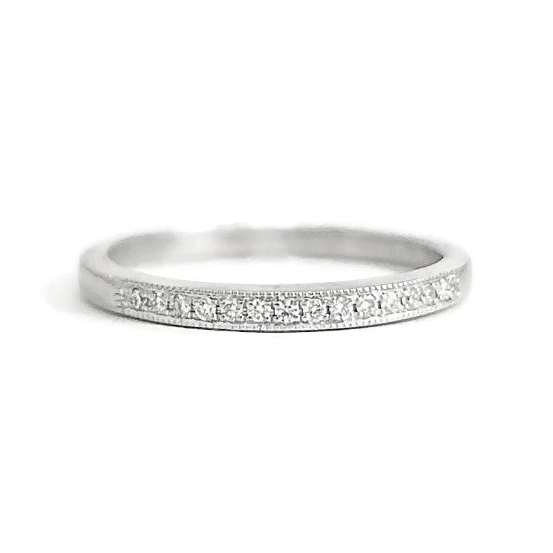 Thin Milgrain Edge Diamond Wedding Band Ring Platinum, Size 5, .05 CTW: Thin Milgrain Edge Diamond Wedding Band Ring Platinum, Size 5, .05 CTW This is a lovely wedding band ring. Don't hesitate to ask any questions! Diamonds: 14 round brilliant cuts .05 ctw; F-G, SI1