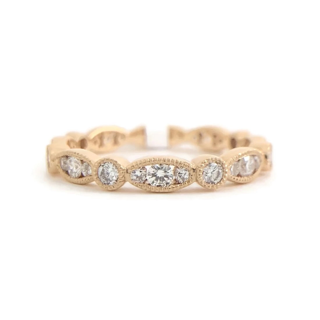 Marquise Round Bezel Diamond Wedding Band Ring 18K Rose Gold, .59 CTW: Marquise Round Bezel Diamond Wedding Band Ring 18K Rose Gold, .59 CTW This is a beautiful and stunning ring! Don't hesitate to ask any questions! Diamonds: 27 round brilliant cuts .59 ctw, G, VS2-SI1