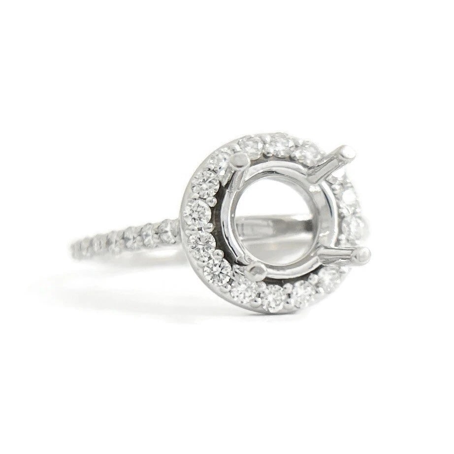 Round Halo Diamond Engagement Ring Setting Mounting 14K White Gold .55 CTW: Round Halo Diamond Engagement Ring Setting Mounting 14K White Gold .55 CTW This is a gorgeous diamond engagement ring mounting ready to house a diamond or gemstone of your choice. Don't hesitate to as