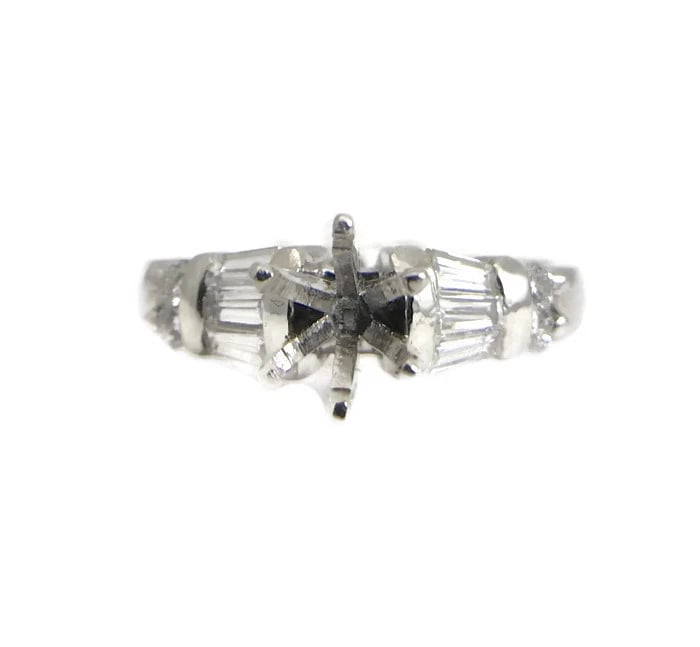 Tapered Baguette Round Diamond Platinum Engagement Ring Setting Mounting .70 CTW: Tapered Baguette Round Diamond Platinum Engagement Ring Setting Mounting .70 CTW This stunning diamond engagement ring mounting will be something she will love forever. Ready to house a sparkling