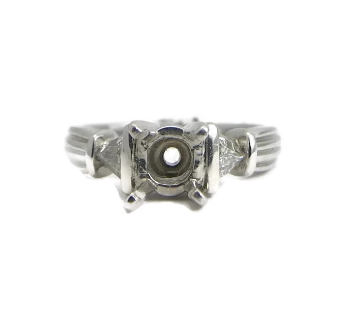 Trillion Triangle Diamond Platinum Engagement Ring Setting Mounting, .20 CTW: Trillion Triangle Diamond Platinum Engagement Ring Setting Mounting, .20 CTW This stunning diamond engagement ring mounting will be something she will love forever. Ready to house a diamond or