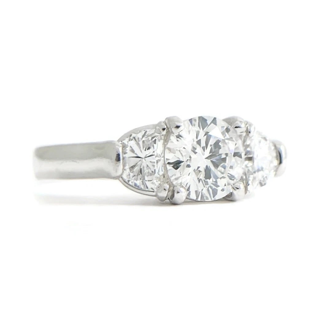 3-Stone Round Half Moon Diamond Engagement Ring Platinum 1.27 CTW: 3-Stone Round Half Moon Diamond Engagement Ring Platinum 1.27 CTW This is a gorgeous diamond engagement ring! Please let us know if you have any questions! Diamonds: 1.27 ctw; 1 round brilliant cut, .