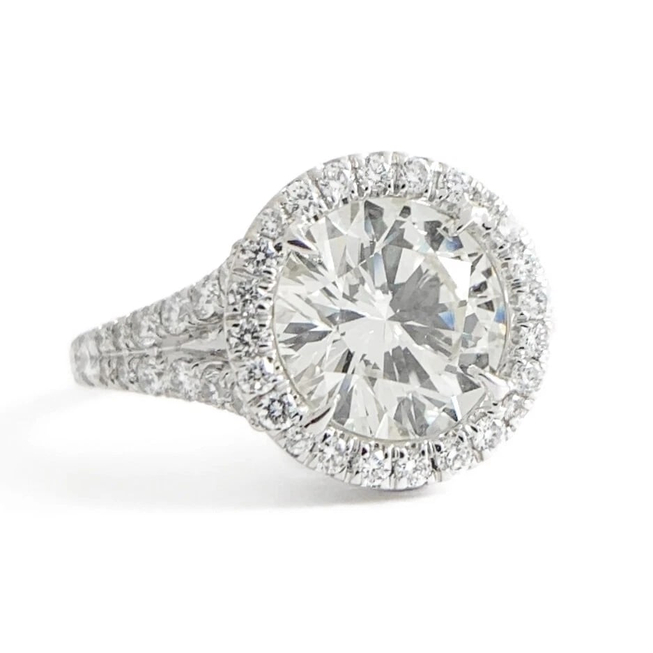 Round Diamond Halo Split Shank Engagement Ring 18K White Gold, 2.40 CTW: Round Diamond Halo Split Shank Engagement Ring 18K White Gold, 2.40 CTW This is a gorgeous diamond engagement ring! Please let us know if you have any questions! Diamonds: 2.40 ctw; 1 round brilliant 