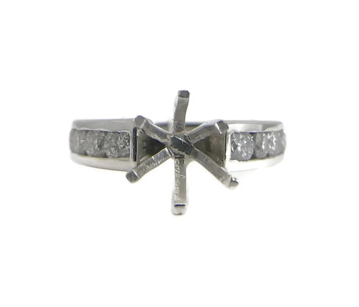 Round Channel-Set Diamond Platinum Engagement Ring Setting Mounting .60 CTW: Round Channel-Set Diamond Platinum Engagement Ring Setting Mounting .60 CTW This stunning diamond engagement ring mounting will be something she will love forever. Ready to house a diamond or