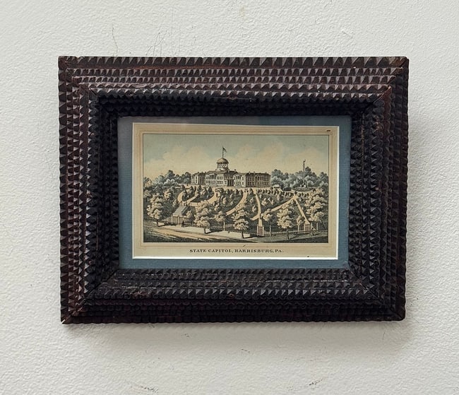 Tramp Art Frame: Early tramp art frame with a mounted illustration of the Pennsylvania state capital. On the reverse of the frame on the board backing the frame is an illustration of 'Smull's Legislative Hand Book -