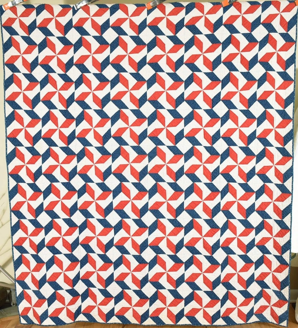 1880's Red, White & Blue Pinwheels Quilt: Title: 1880's Red, White & Blue Pinwheels Quilt Date: 1880's Origin: Ohio Material: Cotton Dimensions: Shipping: Domestic: Flat-rate of $25.00 to anywhere within the contiguous U.S. International: For