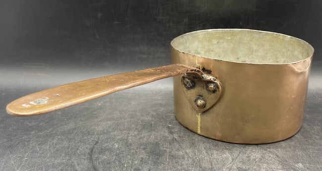 Large hand forged copper pot. Marked 55. Capacity 2quarts.: Date/Period: unknown Dimension: approx 3.75" deep, 6.5" diam 14.25" with handle Material: copper Additional Information: Large hand forged copper pot. Marked 55. Capacity 2quarts. Shipping: Domestic: