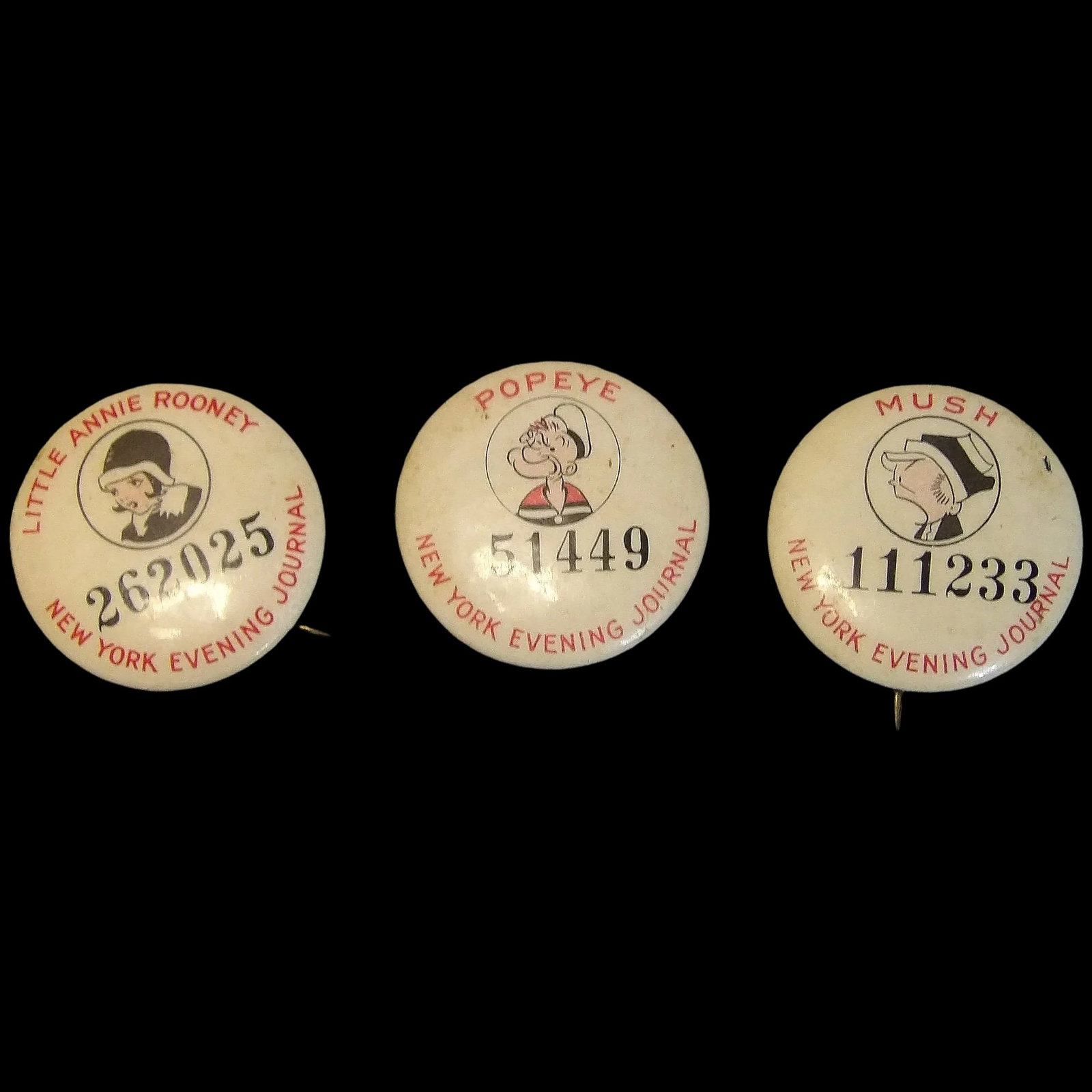 New York Evening Journal Pinback Button of Little Annie Rooney, Mush, and Popeye: This set of 3 New York Evening Journal Pinback Button of Little Annie Rooney, Mush, and Popeye are in very good condition. All still have inside info on button and were produced by Local #1 Amalgamate