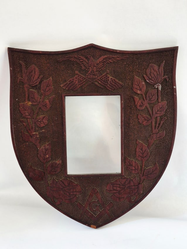 Rare carved frame with eagle and Masonic elements: Found in upstate New York, this walnut frame has the entire surface carved. A spread winged eagle with flags, a Masonic device and a vine on each side with flowers. With stipple carving covering the b