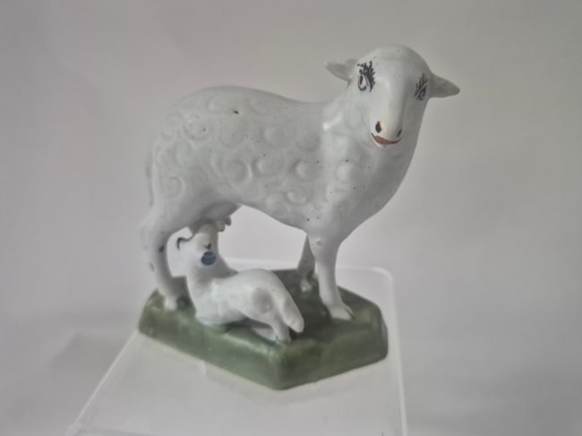 Delft ewe and lamb. Beautiful face, excellent details: Figures are rarely found in delft. This one c. 1750 and 4 inches long. Shipping: Domestic: Shipping rates are determined by destination International: Foreign shipping rates are determined by