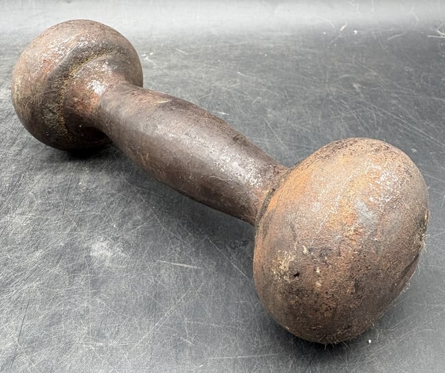 Antique Cast Iron Globe Dumbell: Date/Period: Late 19th early 20th century Dimension: Approx 6.5" Long x 2.25" diameter wt: 3lb 6 oz Material: Cast Iron Additional Information: Often referred to as a "Circus Strongman or Cannonball