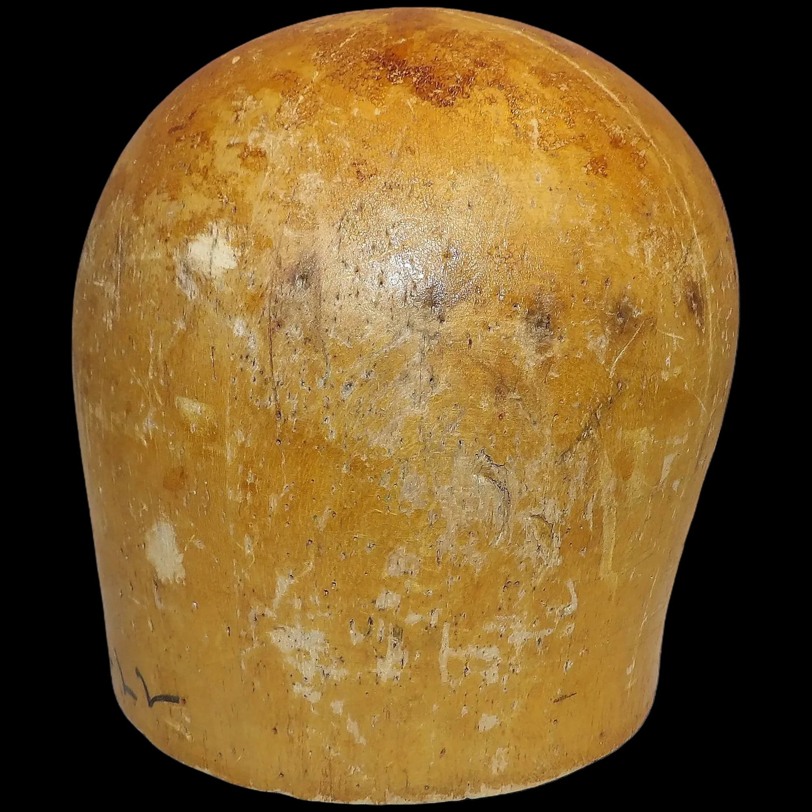 Antique Wooden Millinery Hat Mold Block Natural Finish Display Piece: This antique wooden millinery hat mold block exudes timeless charm with its natural wood finish. An excellent addition for milliners or as a decorative display. * Wood construction * Smooth natural fi