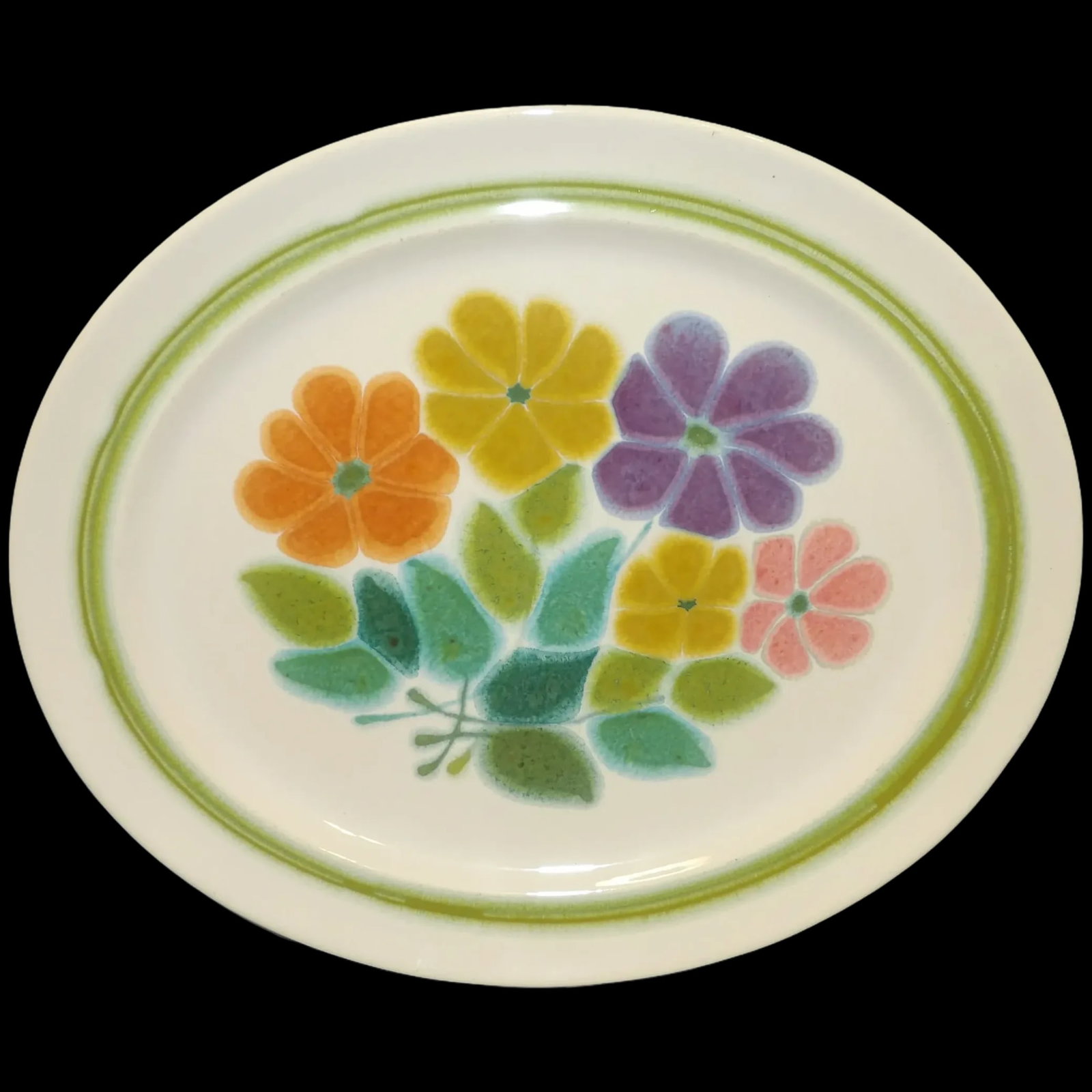 Floral Oval Serving Platter 13 1/2" by Franciscan Discontinued. Actual: 1971 - 1977: This Floral Oval Serving Platter 13 1/2" by Franciscan Discontinued. Actual: 1971 - 1977 is in excellent shape. NO chips, cracks, crazing or utensil marks. Oven safe and Color Fast. Description: USA, 