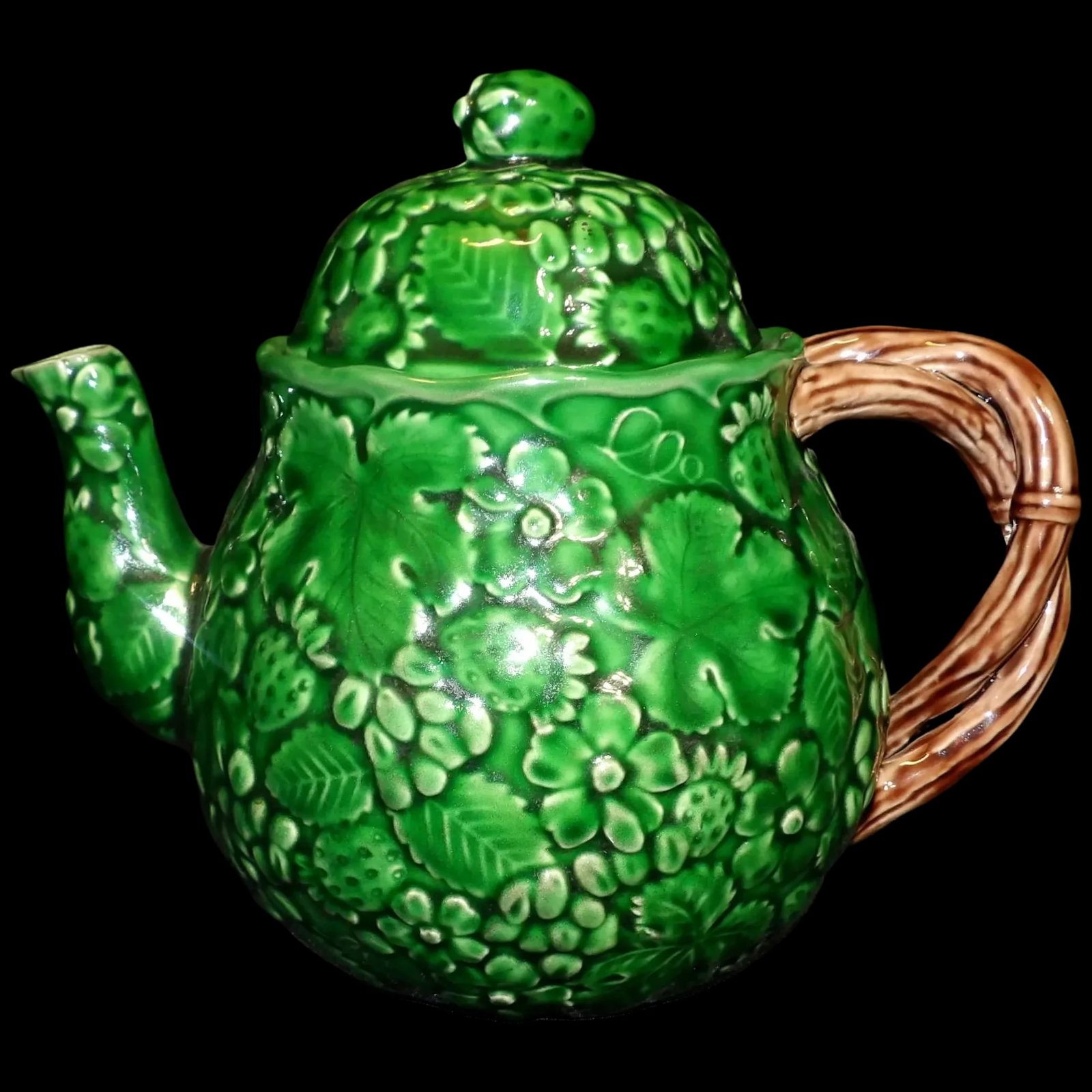 Haddon Group 1983 Green Strawberry Leaves and Flowers Teapot: This Haddon Group 1983 Green Strawberry Leaves and Flowers Teapot is in near MINT condition. It appears to never have been used except for display. The estate it came from had several teapots used