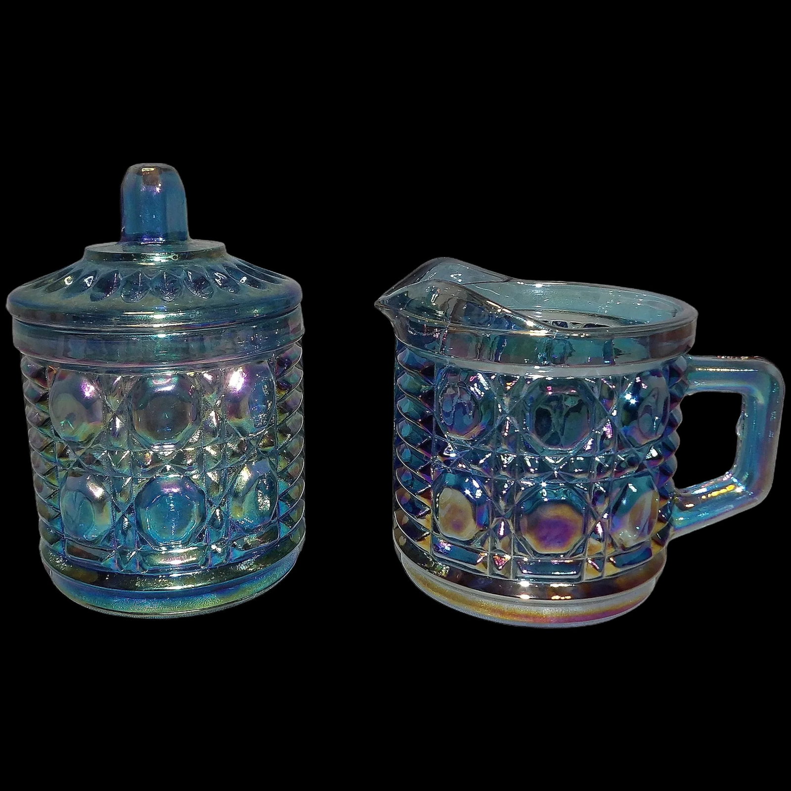 Indiana Glass Windsor Blue Carnival Glass Sugar and Creamer: Indiana Glass Windsor Blue Carnival Glass Sugar and Creamer. This pattern is fairly hard to find and these are in excellent condition. NO chips, cracks or stains, They measure 4 3/4" for sugar bowl wi