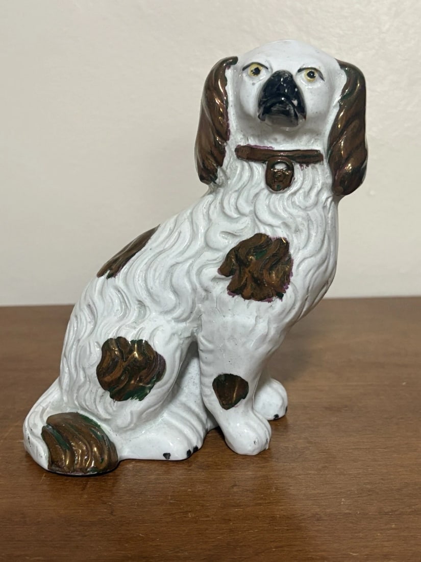 Staffordshire Spaniel Dog: It is 6 1/4" high and dates around the 1880's. It has no chips, cracks or repairs Shipping: Domestic: Flat-rate of $15.00 to anywhere within the contiguous U.S. International: Foreign shipping rates a