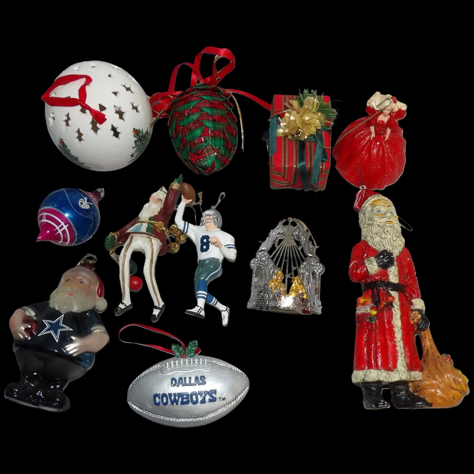 Collection of Specialty Ornaments: This Collection of specialty ornaments includes 2 Dallas Cowboy , 2 Santas, 1 elf, 2 cloth, Spode ornament, 1 Vintage ornament, 1 Barbie, 1 nativity scene. Shipping: Domestic: Flat-rate of $19.00 to a