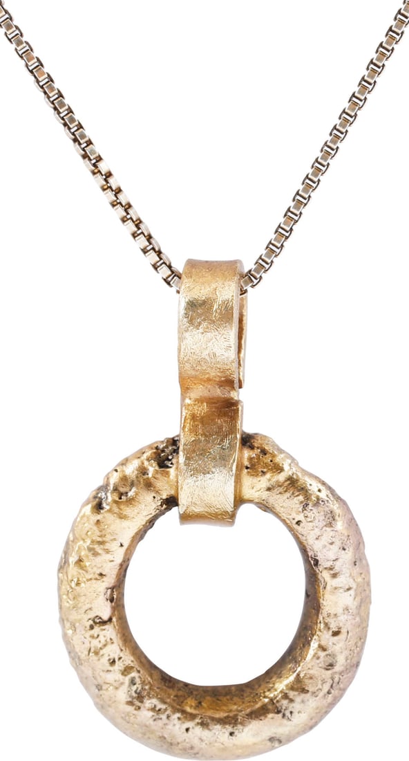 CELTIC PROSPERITY RING NECKLACE, C.300-100 BC: Before the Roman invasion of the British Isles, rings of bronze, silver, and gold were used as a means of exchange, particularly in Ireland. Most exchanges of goods and property were conducted by