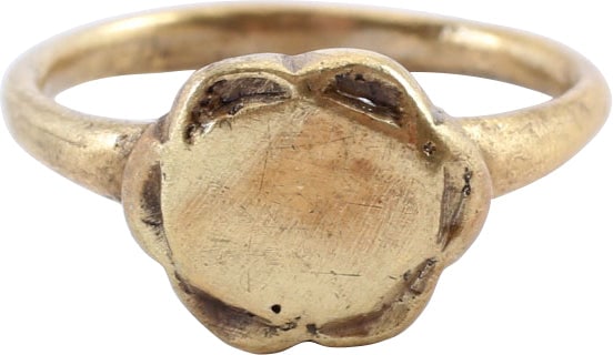 MEDIEVAL LADIES RING, 10TH CENTURY AD, SIZE 4 ¾: Gilt bronze, size 4 ¾ for wear on the small finger as was the custom. 2.0mm well rounded section band with the thickened bottom, a carry over from the Roman style. Raised oval bezel with
