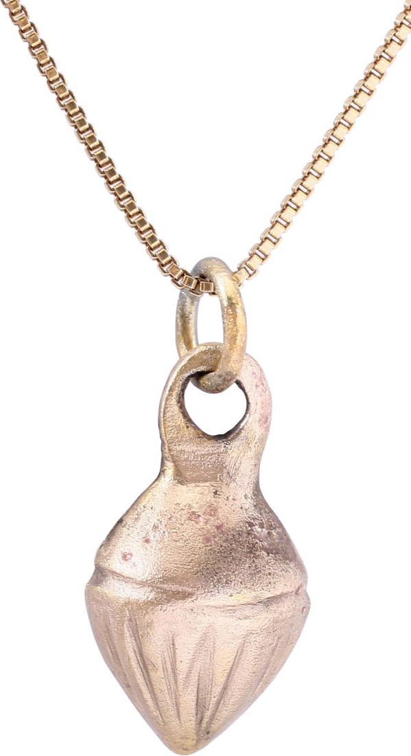 ANCIENT ROMAN SHELL PENDANT NECKLACE C.100-350 AD.: Gilt bronze, about 3/4" height plus the ring. Large domed form, fluted and the back recessed. A form about which there is some uncertainty. Romans were very dependent on the sea and used sea motifs, r
