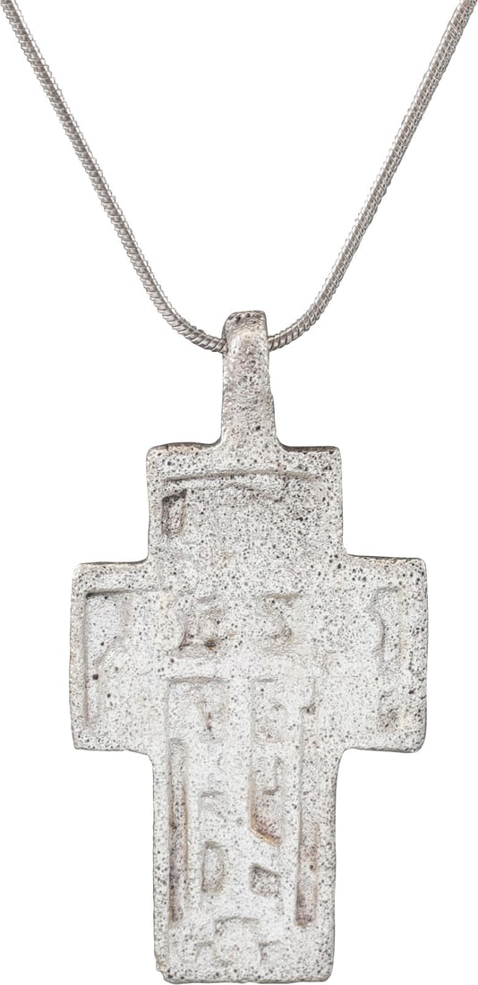 EASTERN EUROPEAN CHRISTIAN CROSS NECKLACE, 17TH-18TH CENTURY: 17th-18th Century, Orthodox rite. Silvered bronze, just over 2” (2.03”) height. Broad beams with raised edges and a plain cross center with charges and ciphers at the terminals. Reverse wi